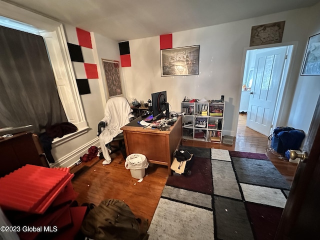 office area with hardwood / wood-style flooring