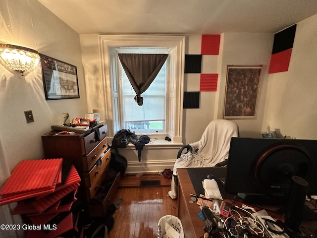 bedroom featuring dark wood-type flooring