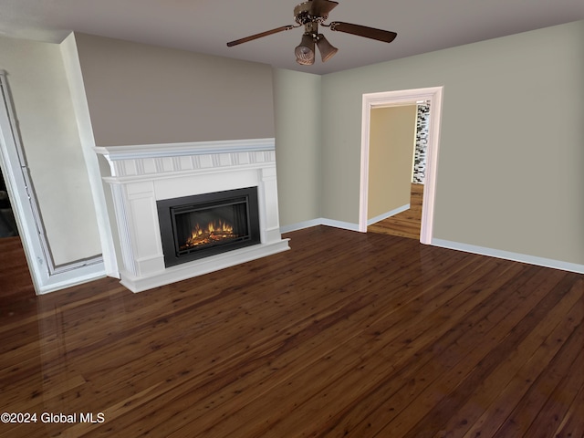 unfurnished living room with ceiling fan and dark wood-type flooring