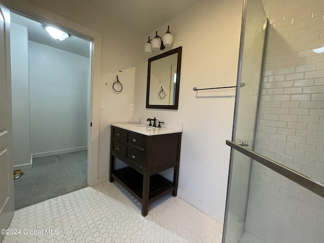 bathroom with vanity and an enclosed shower