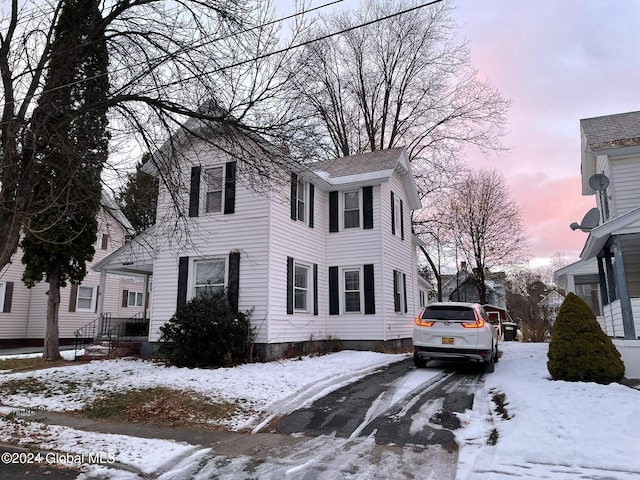 view of snow covered property