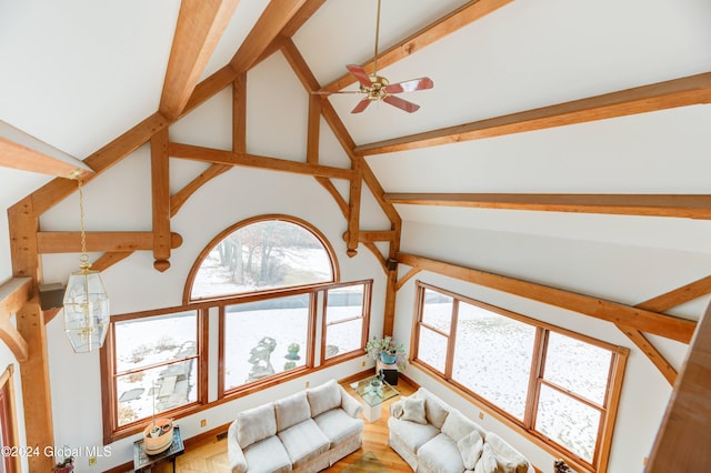 living room featuring ceiling fan, beamed ceiling, high vaulted ceiling, and hardwood / wood-style floors