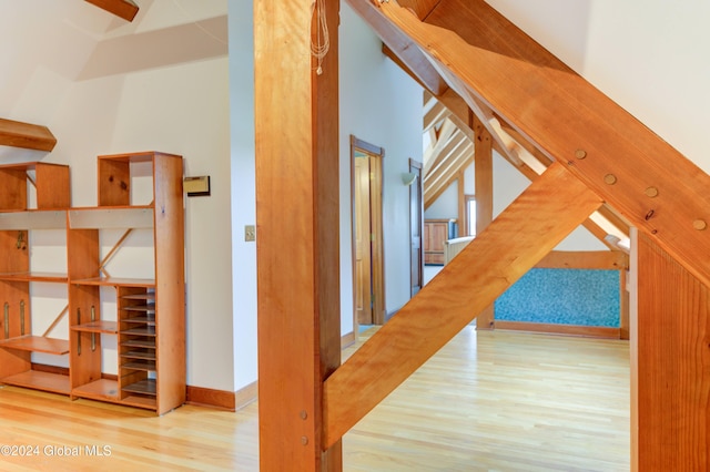 hall with hardwood / wood-style flooring