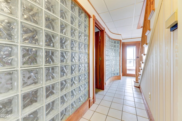 corridor with tile patterned flooring