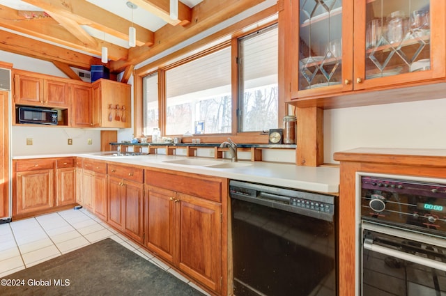 kitchen featuring black appliances, sink, hanging light fixtures, light tile patterned floors, and beamed ceiling