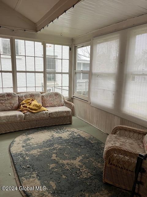 sunroom / solarium with lofted ceiling