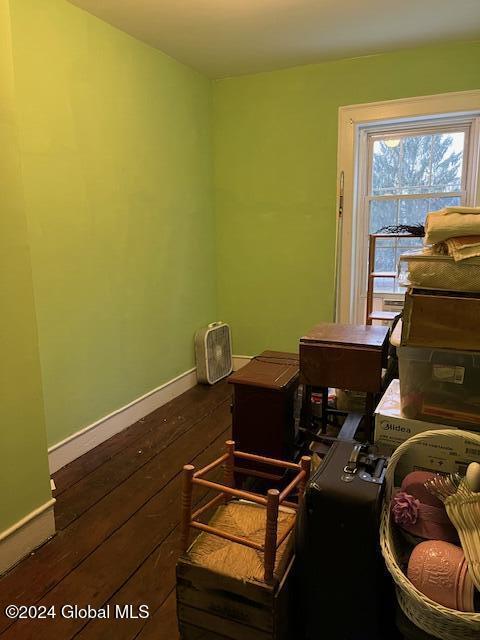 miscellaneous room with dark hardwood / wood-style flooring