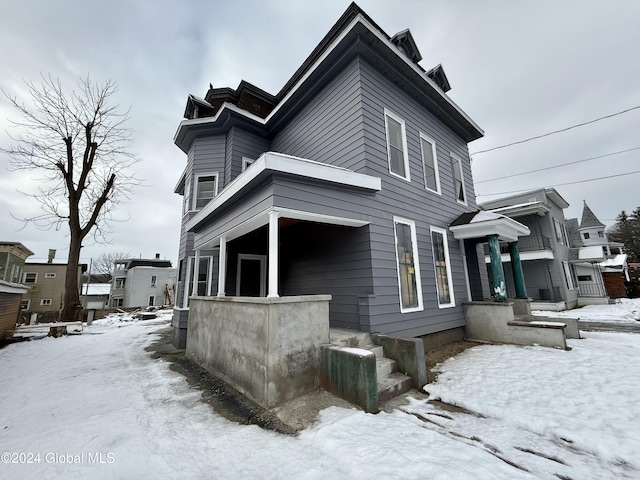 view of snow covered property