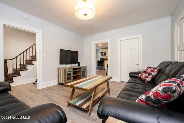 living room with light hardwood / wood-style floors