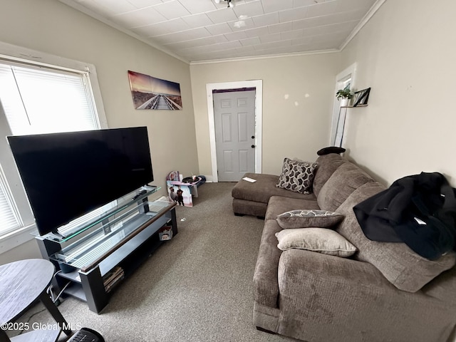 carpeted living area with crown molding