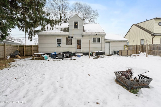 view of snow covered property