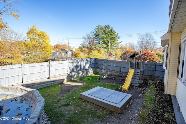 view of yard with a playground