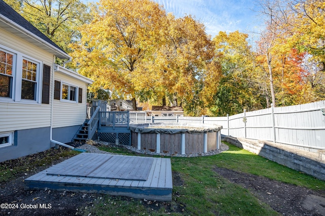 view of yard featuring a pool side deck