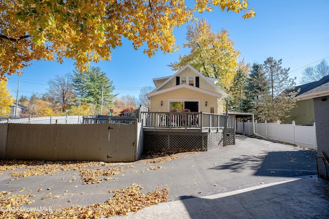 rear view of house with a deck