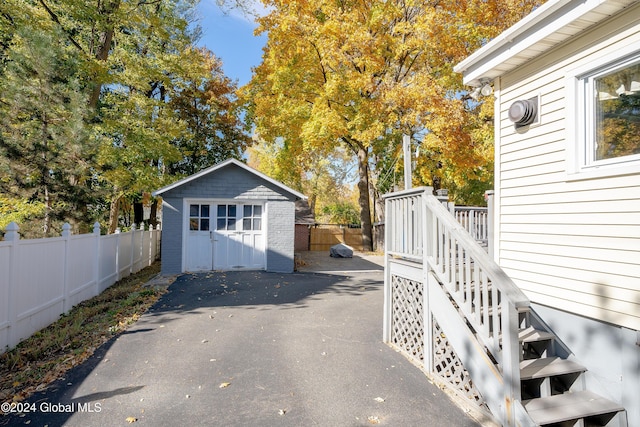 exterior space featuring an outdoor structure