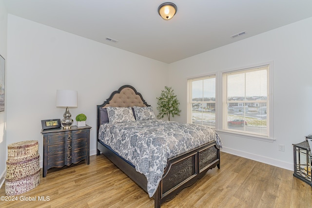 bedroom featuring light hardwood / wood-style flooring