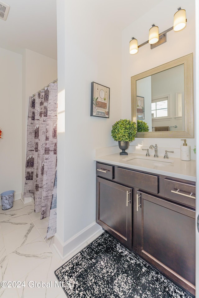 bathroom featuring vanity