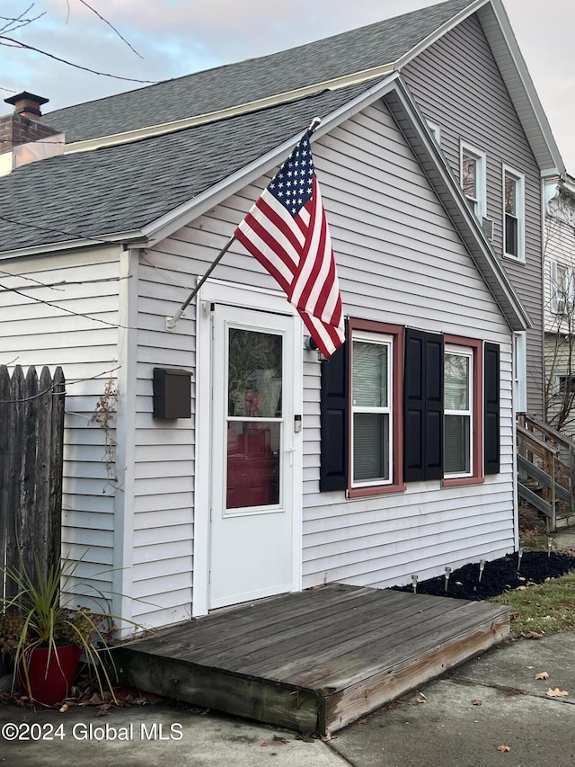 view of front of house with a wooden deck