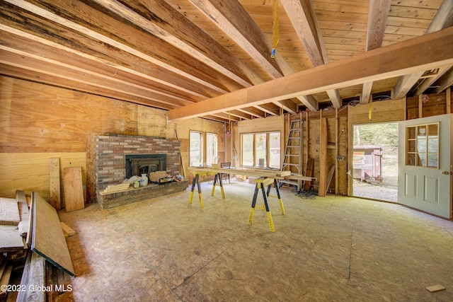 playroom with a brick fireplace