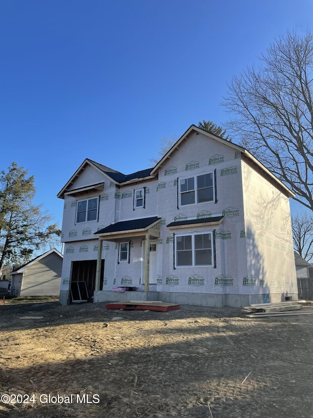 property in mid-construction featuring a garage