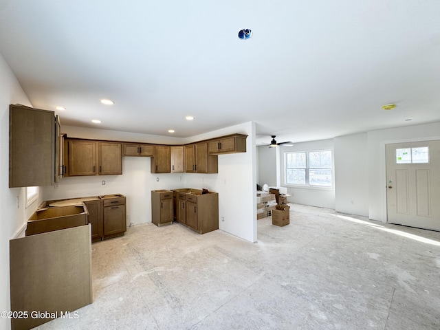 kitchen featuring ceiling fan