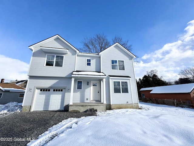 front of property featuring a garage