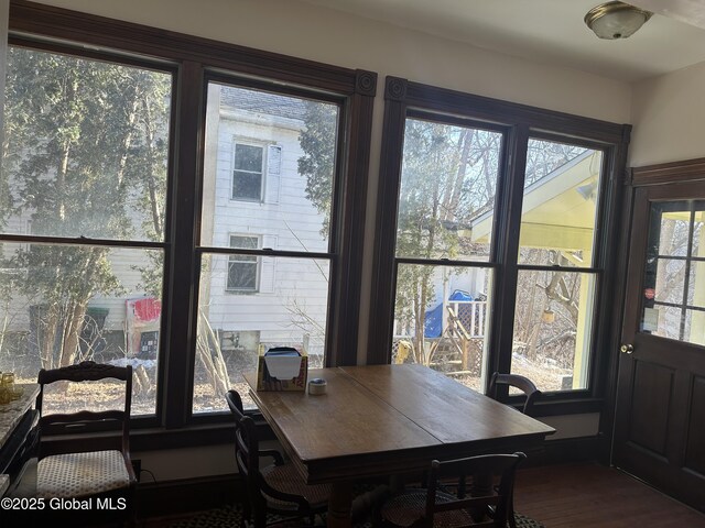 dining room with wood finished floors