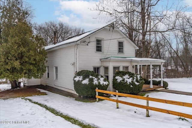 view of snow covered property