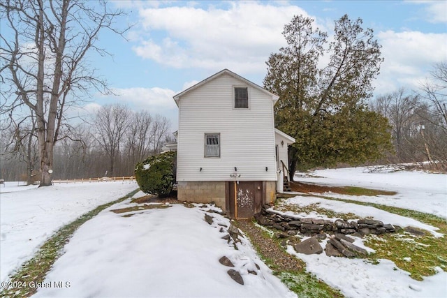 view of snow covered property