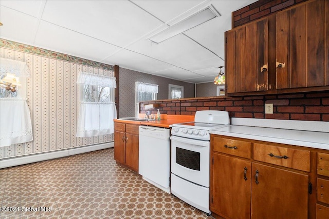 kitchen with white appliances and baseboard heating