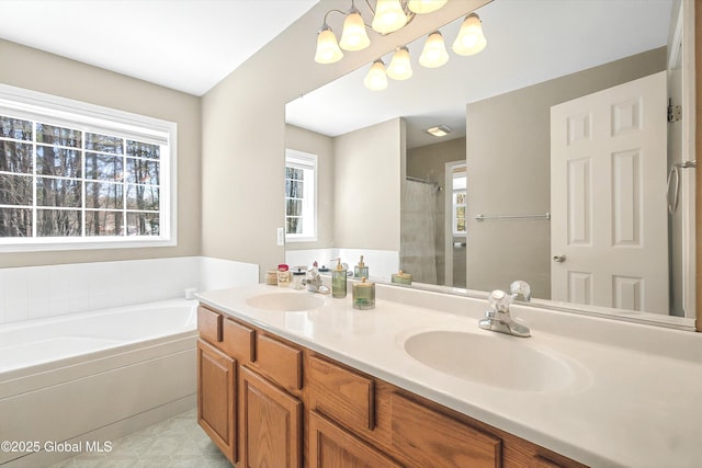 bathroom featuring a sink, a shower with curtain, a bath, and double vanity