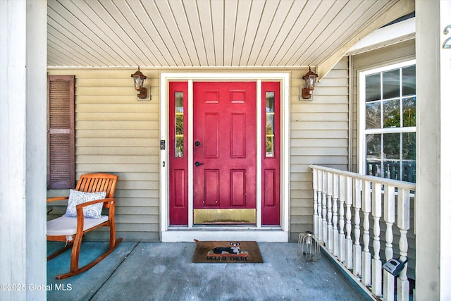 doorway to property with a porch