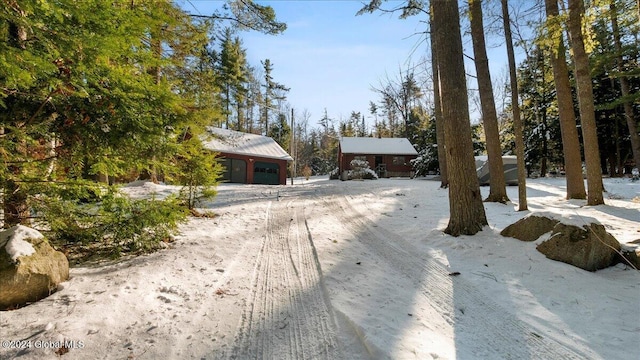 view of front of property with an outbuilding and a garage