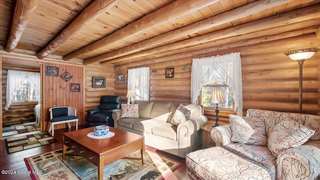 living room with a wealth of natural light, hardwood / wood-style floors, beamed ceiling, and wooden ceiling