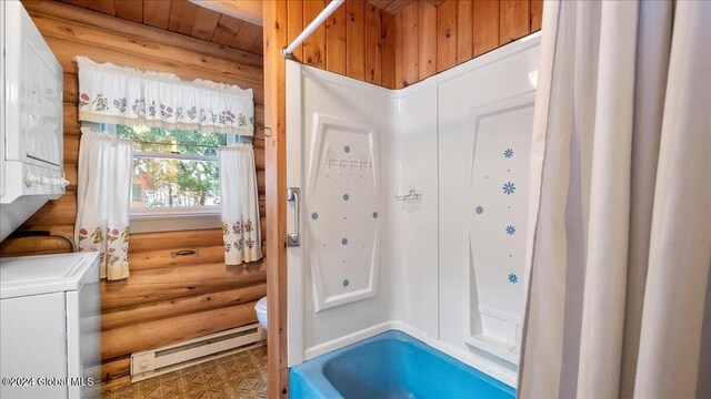 bathroom with wooden ceiling, a baseboard heating unit, stacked washer and dryer, toilet, and rustic walls