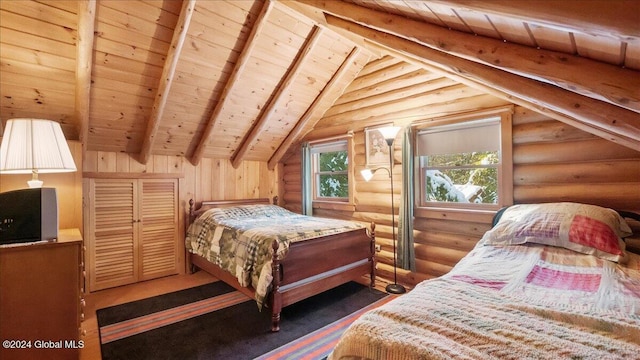 bedroom featuring lofted ceiling with beams, log walls, and wooden ceiling