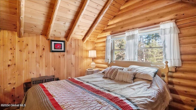 bedroom with log walls, vaulted ceiling with beams, and wooden ceiling