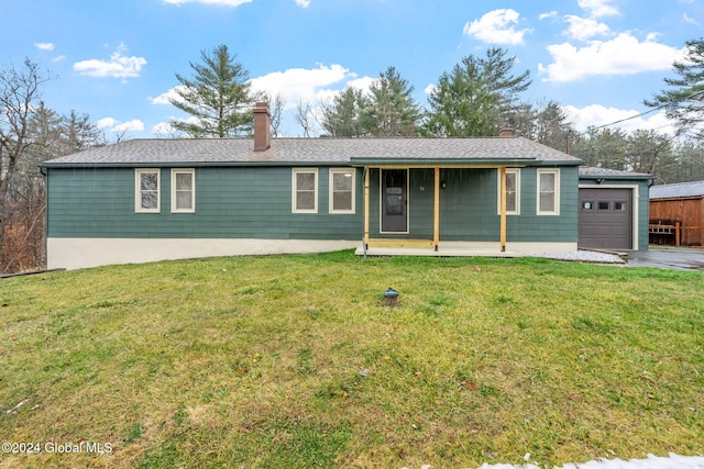 single story home with a front yard and a garage