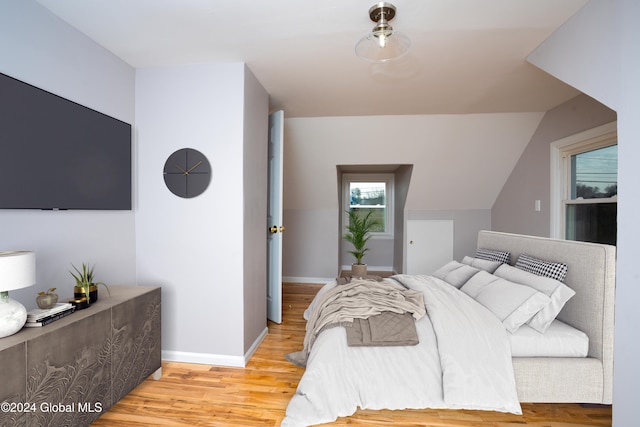 bedroom with light wood-type flooring