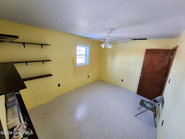 empty room featuring ceiling fan