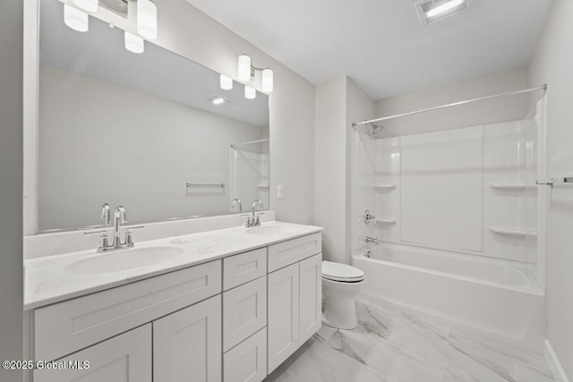 full bathroom featuring shower / bathing tub combination, vanity, and toilet