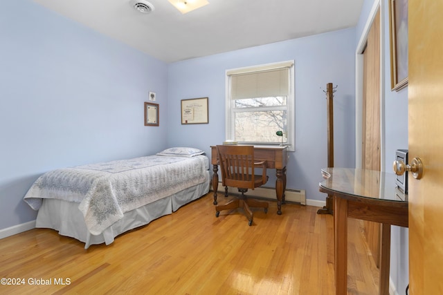 bedroom featuring light wood-type flooring