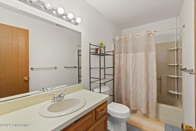 full bathroom featuring shower / bath combo, vanity, toilet, and tile patterned floors