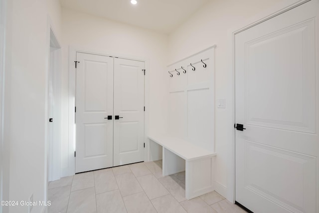 mudroom featuring light tile patterned floors