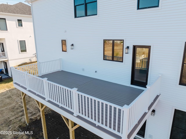 rear view of property with a deck