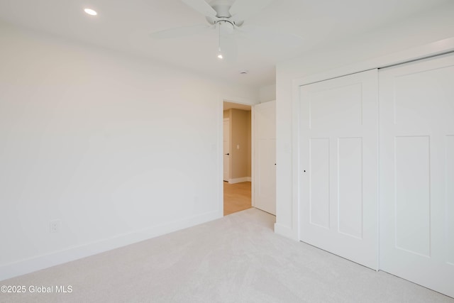 unfurnished bedroom featuring a closet, ceiling fan, carpet floors, baseboards, and recessed lighting