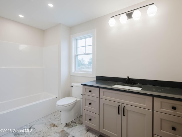 full bathroom with marble finish floor, toilet, vanity, and recessed lighting