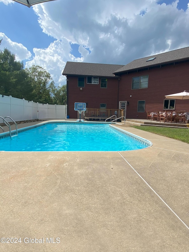 view of pool featuring a patio