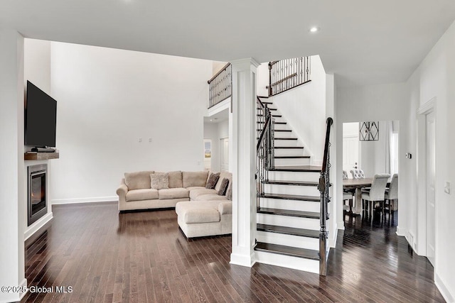 living room featuring dark hardwood / wood-style floors