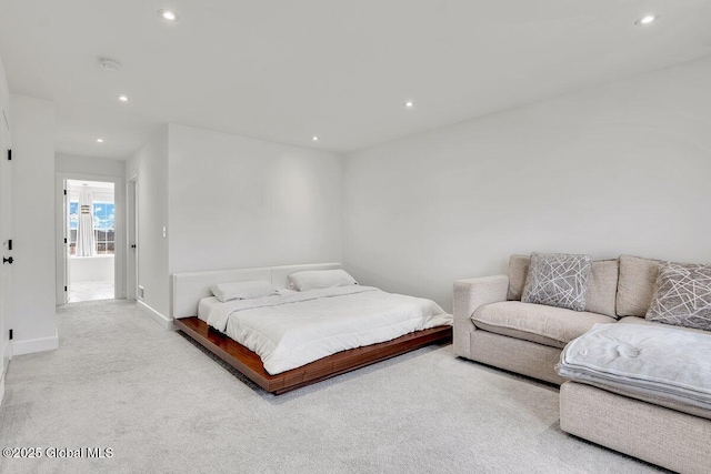 bedroom with light carpet